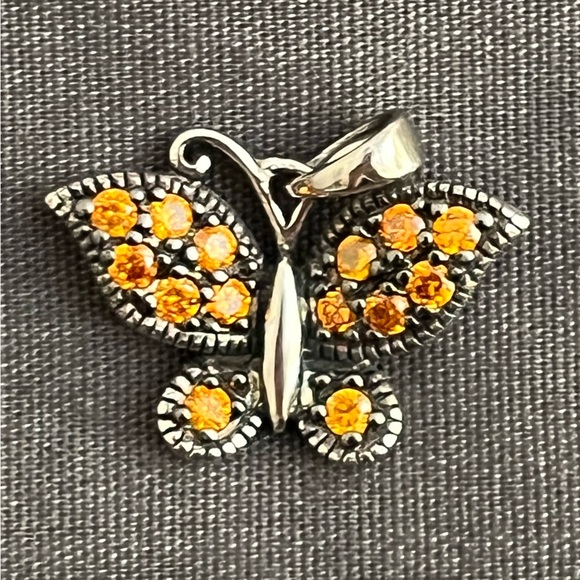 Jewelry - Vintage sterling silver butterfly pendant set with orange CZ stones.